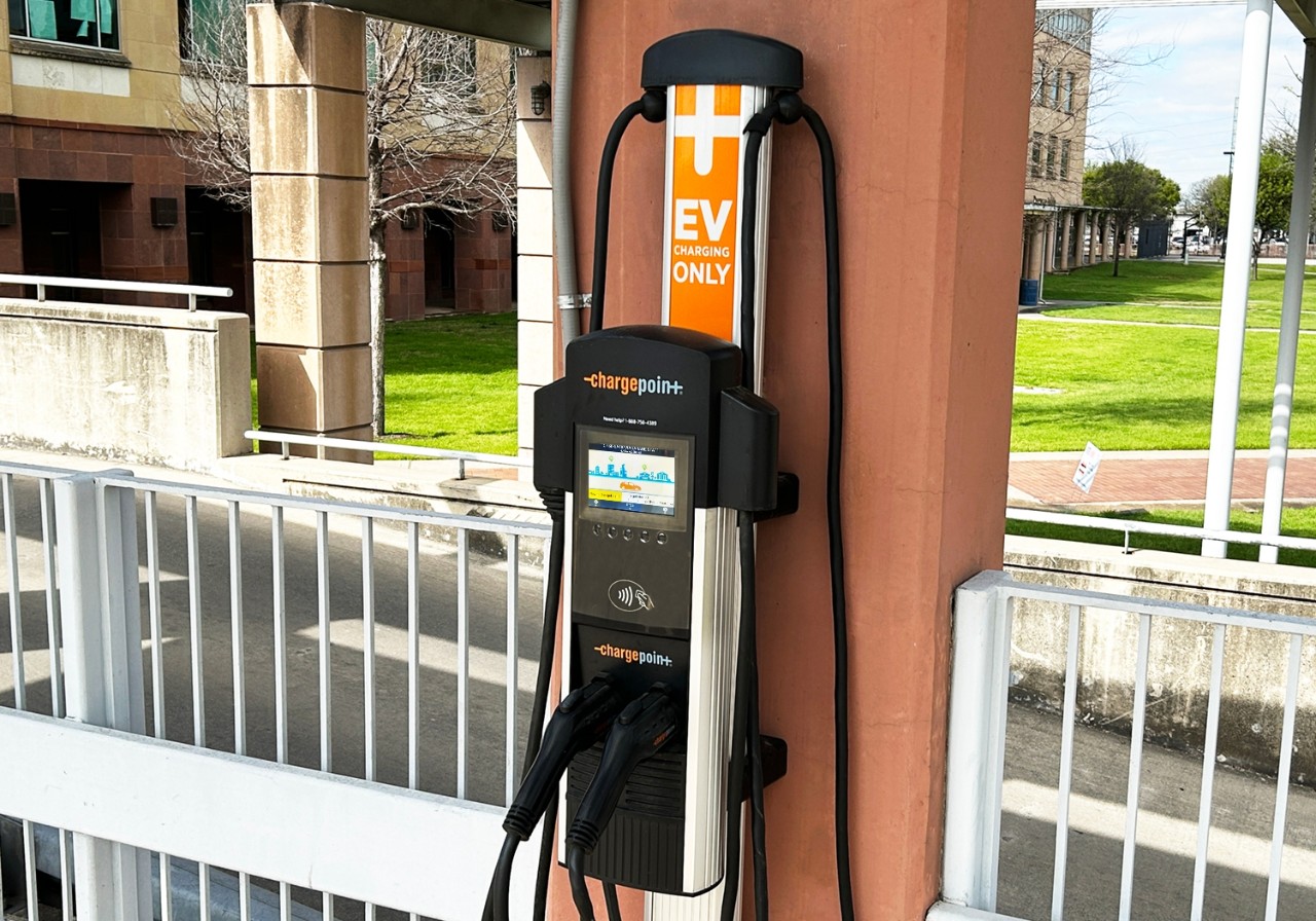 A photo of EV charging at a public charging station